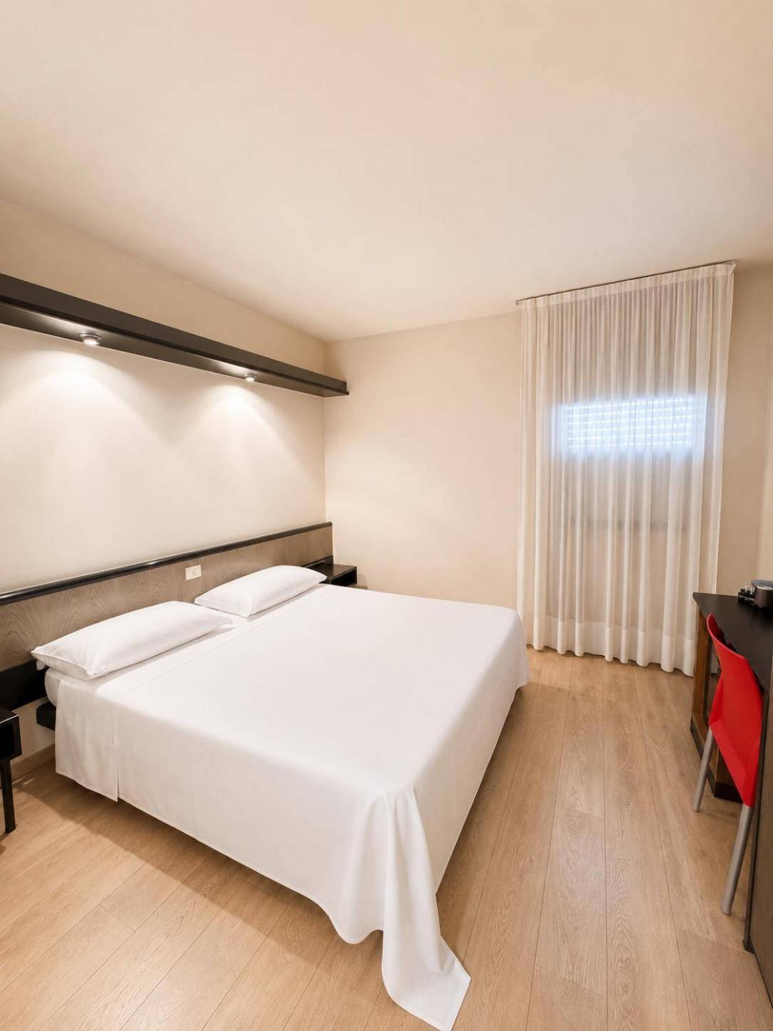 Quarto Standard com Cama de Casal ou 2 de Solteiro e Varanda
